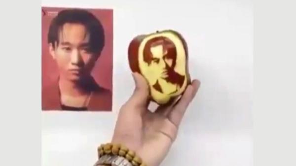 نقاشی حرفه ای چهره روی سیب